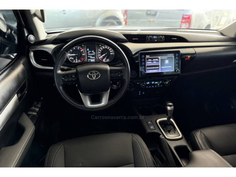 TOYOTA - HILUX - 2021/2021 - Branca - R$ 209.900,00